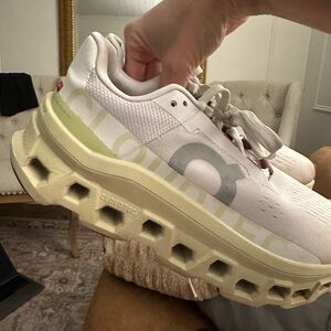 On Running Cloudstratus Women's Running Shoes - White, green and burgundy.